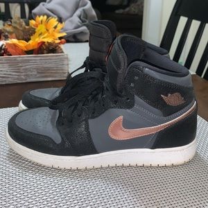 High top Air Jordan 1s Retro.